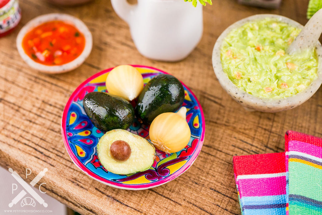 Avocados and Onions on Mexican Talavera Plate