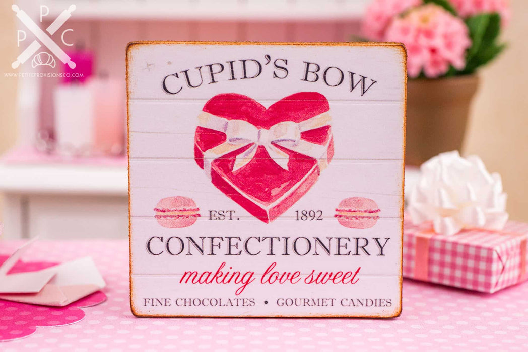 Dollhouse Miniature Cupid's Bow Confectionery Valentine's Day Sign - 1:12 Dollhouse Miniature Valentine's Day Sign