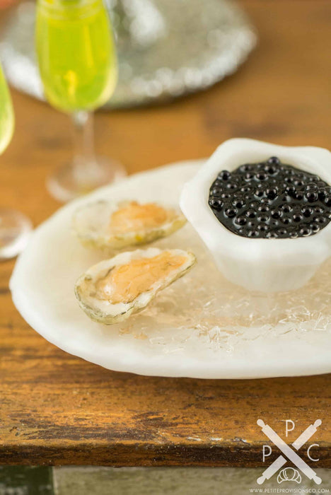 Raw Oysters on the Half Shell and Black Caviar Appetizer