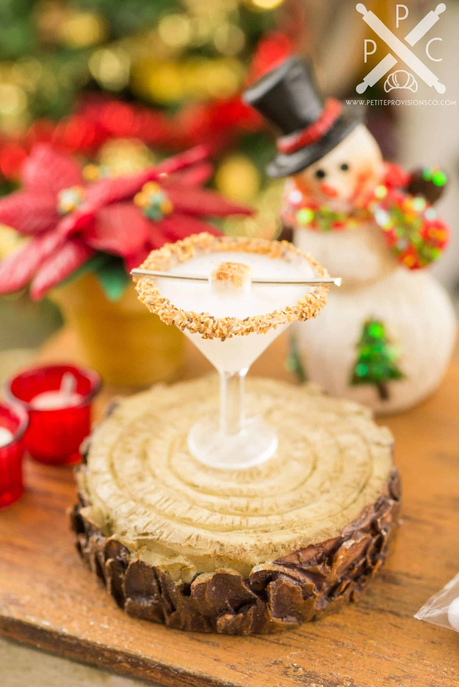 Miniature toasted s'more martini styled for a Christmas celebration.